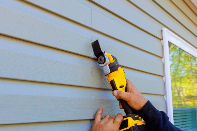 Vinyl Siding Repair - New Panel Installation